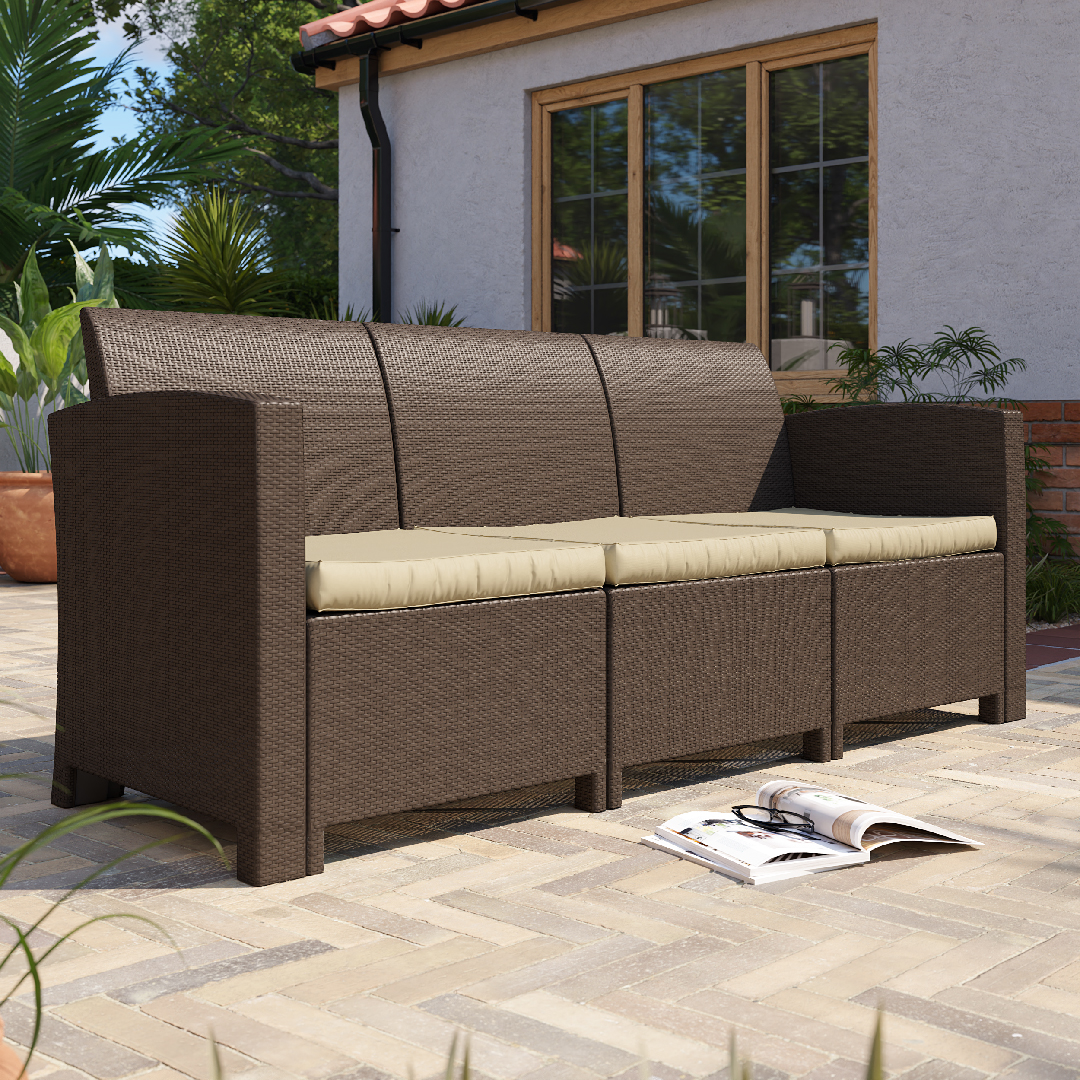 Click to view product details and reviews for 3 Seater Rattan Effect Sofa In Brown With Cream Cushions.